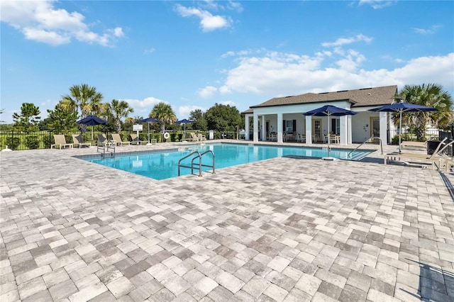 view of pool featuring a patio