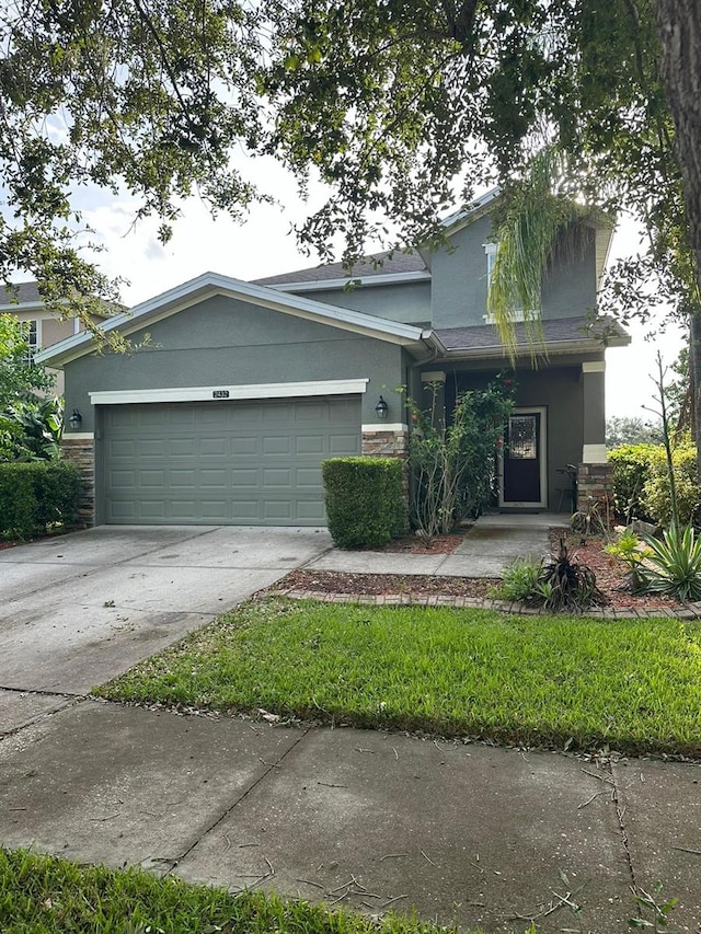 view of front of home with a garage