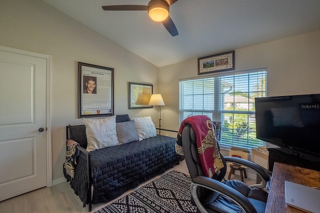 bedroom featuring vaulted ceiling, ceiling fan, and light hardwood / wood-style floors