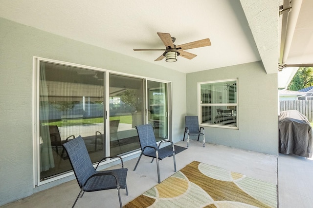 view of patio / terrace featuring ceiling fan and a grill