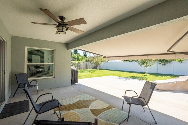 view of patio with ceiling fan