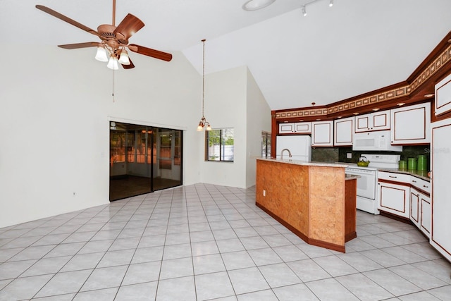 kitchen with high vaulted ceiling, backsplash, white appliances, pendant lighting, and ceiling fan