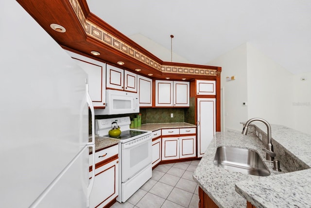 kitchen featuring light tile patterned flooring, sink, lofted ceiling, decorative backsplash, and white appliances