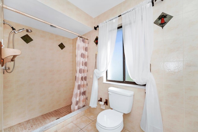 bathroom with walk in shower, tile walls, toilet, and tile patterned floors