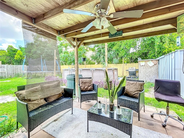 view of patio / terrace featuring ceiling fan