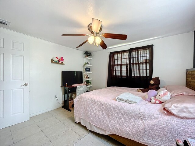 bedroom with light tile patterned floors and ceiling fan