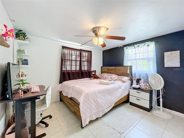 tiled bedroom featuring ceiling fan