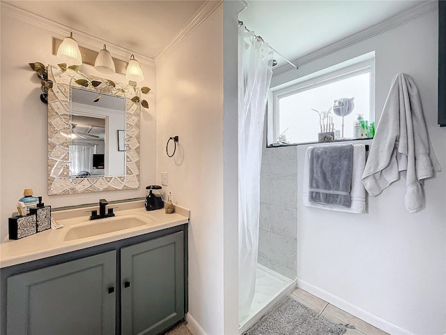 bathroom featuring a shower with shower curtain, ornamental molding, tile patterned flooring, and vanity