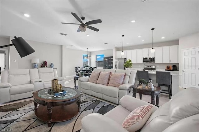 living room with ceiling fan