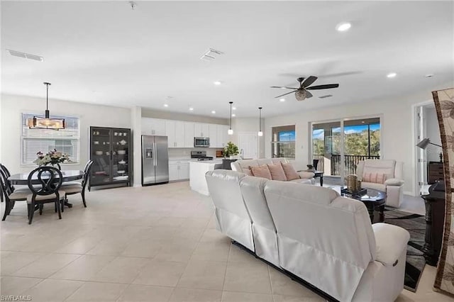 living room with ceiling fan