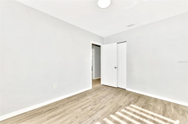 unfurnished bedroom featuring light hardwood / wood-style floors