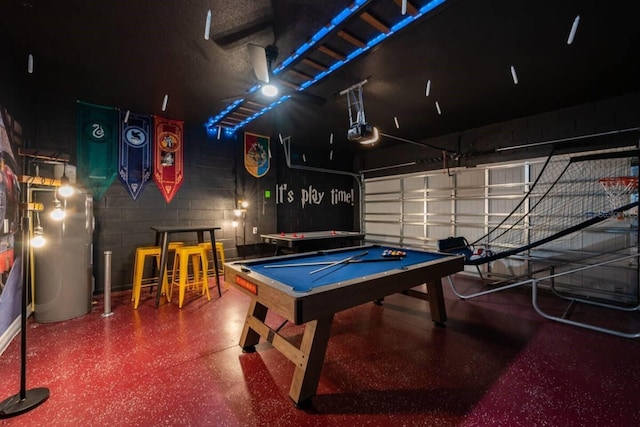 recreation room featuring billiards and water heater