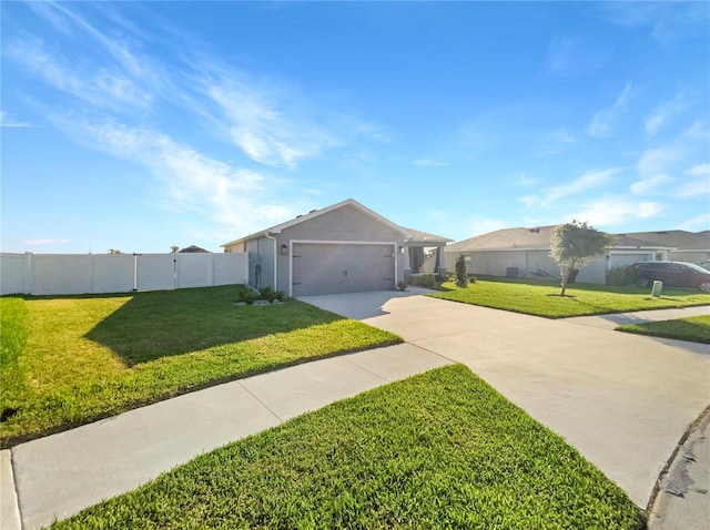 ranch-style home with a garage and a front yard