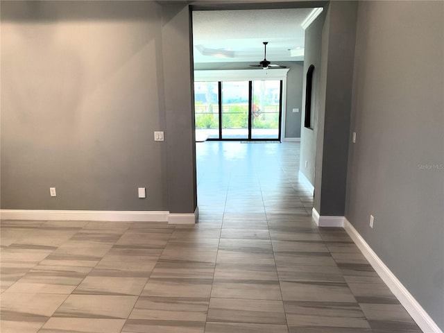 corridor featuring tile patterned floors