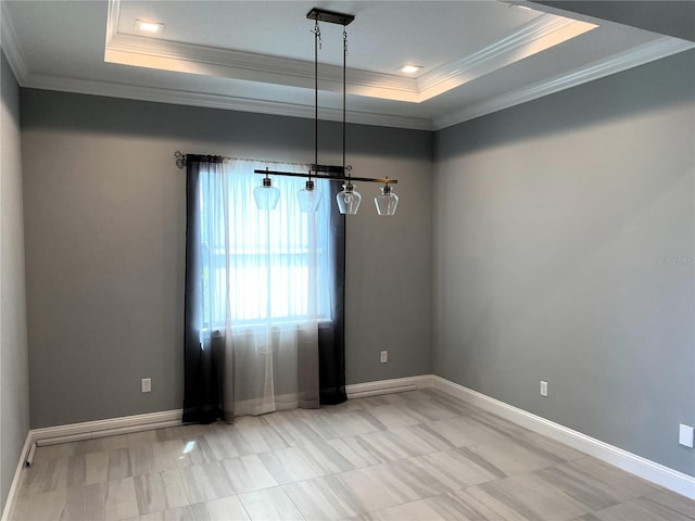 11 Rio Vista Dr, Palm Coast, FL 32137 - unfurnished room featuring a tray ceiling and ornamental molding