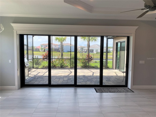 11 Rio Vista Dr, Palm Coast, FL 32137 - doorway to outside featuring crown molding, a ceiling fan, a raised ceiling, and a residential view