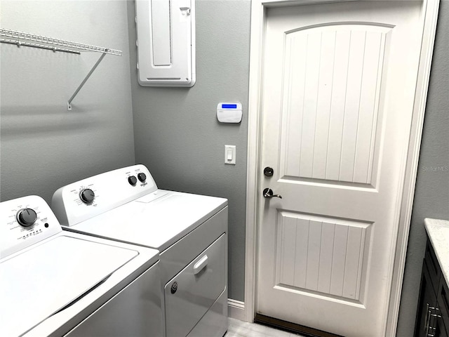 laundry area with separate washer and dryer