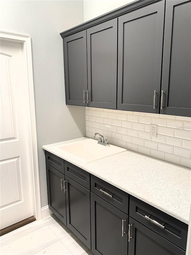 11 Rio Vista Dr, Palm Coast, FL 32137 - bar with backsplash and a sink