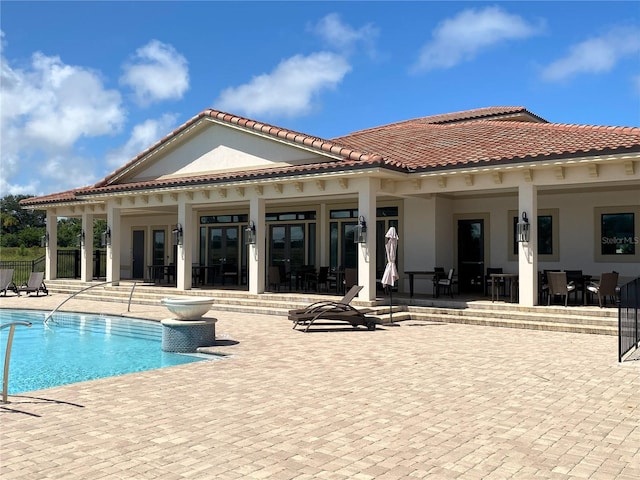 view of pool featuring a patio