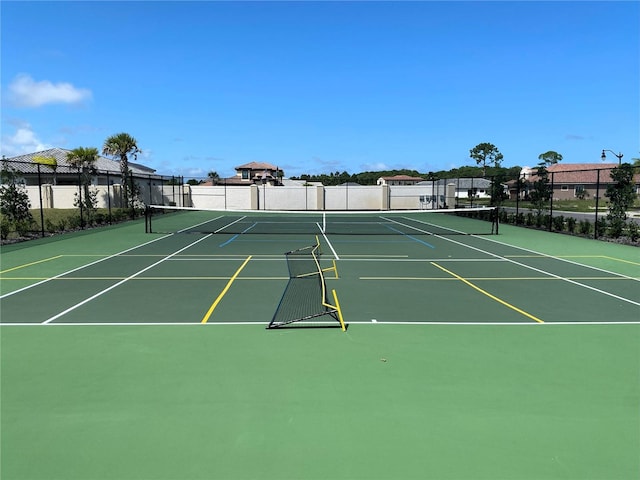 view of sport court featuring basketball hoop