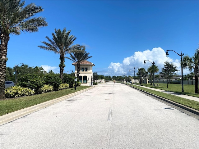 11 Rio Vista Dr, Palm Coast, FL 32137 - view of road with street lights, curbs, and sidewalks