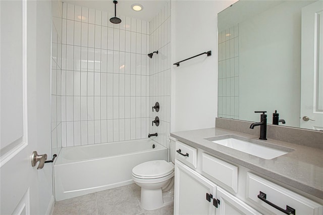 full bathroom with vanity, tiled shower / bath combo, toilet, and tile patterned flooring