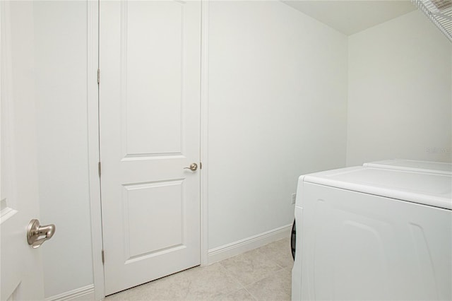 clothes washing area with washer and dryer