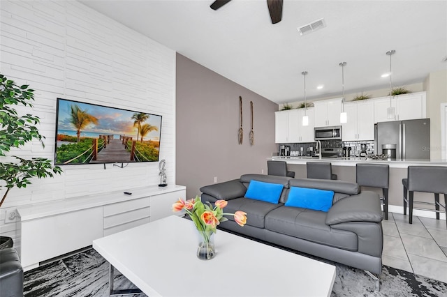 living room featuring ceiling fan