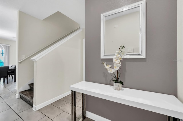 hallway with light tile patterned flooring