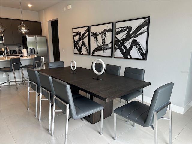 dining room featuring light tile patterned floors