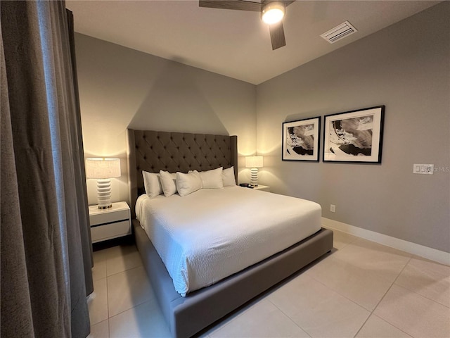 bedroom featuring ceiling fan and light tile patterned floors