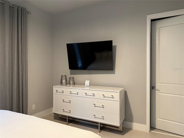 bedroom featuring light tile patterned floors