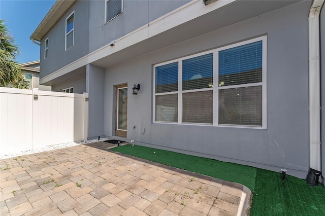 rear view of property with a patio