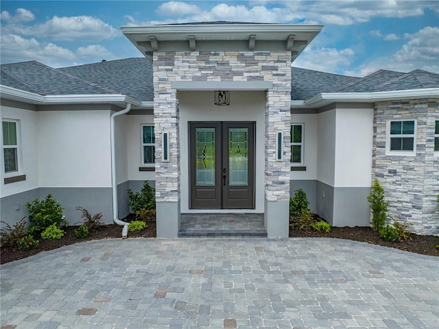 property entrance featuring french doors