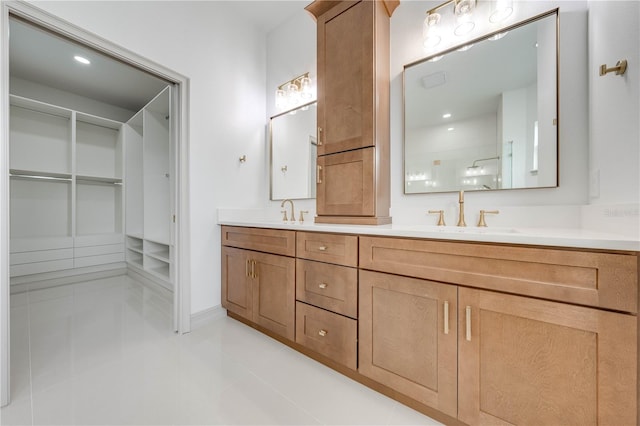 bathroom featuring vanity and tile patterned flooring