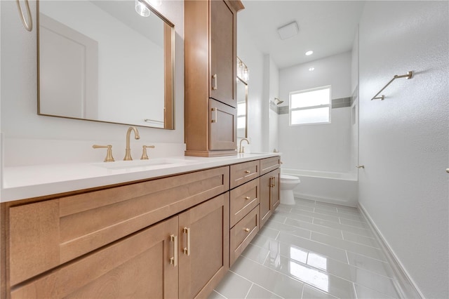 full bathroom with  shower combination, vanity, tile patterned flooring, and toilet