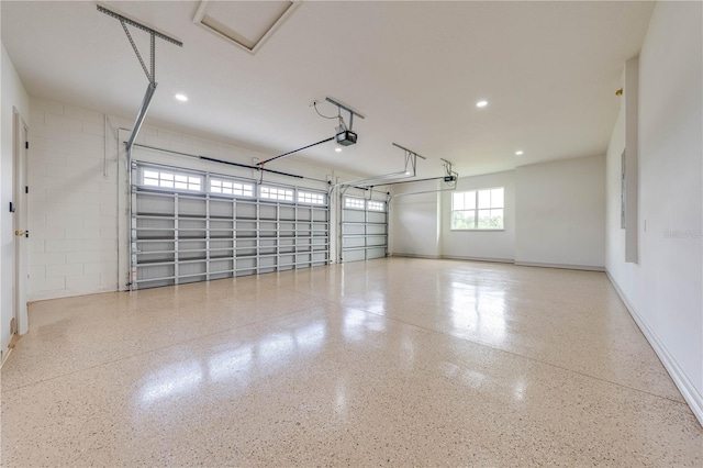 garage featuring a garage door opener