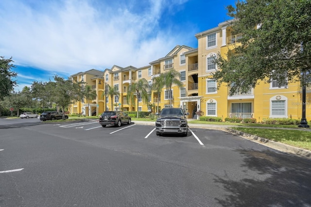 4814 Cayview Ave Unit 21013, Orlando, FL 32819 - view of building exterior featuring uncovered parking