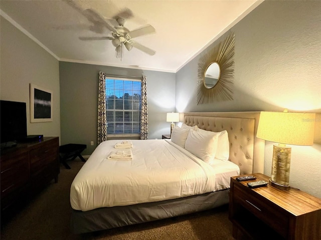 bedroom with ornamental molding, dark colored carpet, and ceiling fan