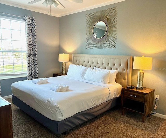 bedroom featuring crown molding, carpet flooring, and ceiling fan