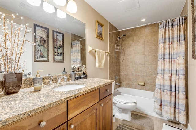 bathroom with tile patterned flooring, shower / tub combo, toilet, and vanity