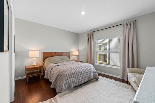 bedroom featuring dark wood-type flooring