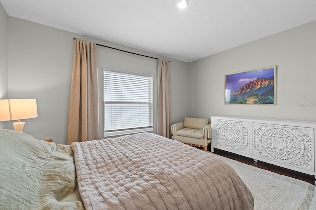 bedroom featuring wood-type flooring