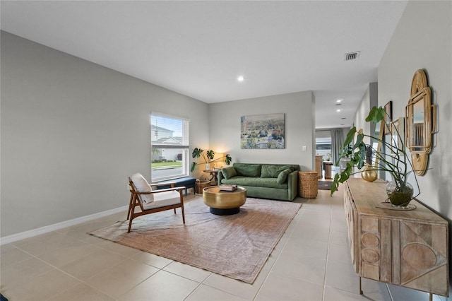 living room featuring light tile patterned floors