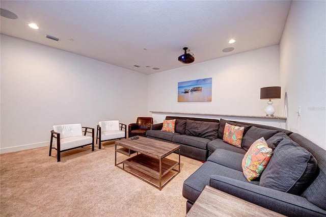 living area with baseboards, light carpet, visible vents, and recessed lighting
