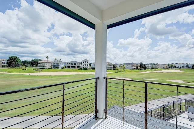 balcony featuring golf course view