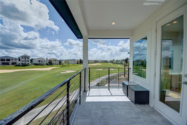 balcony featuring view of golf course