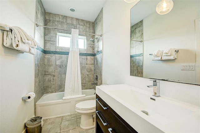 full bathroom with toilet, shower / bath combo with shower curtain, vanity, and tile patterned floors