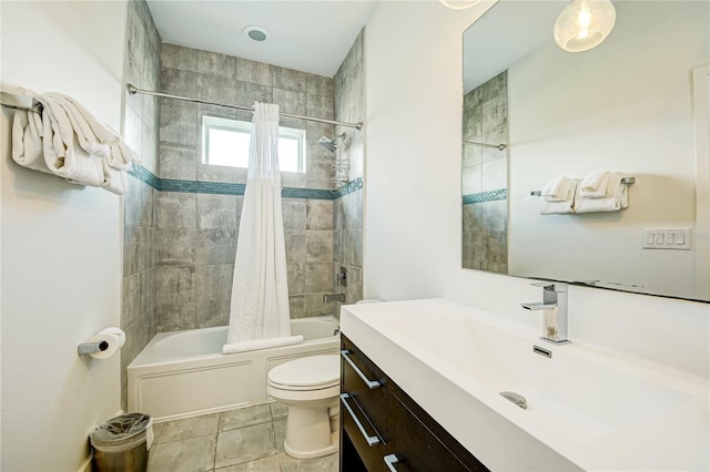 bathroom featuring shower / tub combo, toilet, and vanity