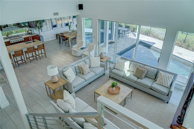 living room with a wealth of natural light and visible vents